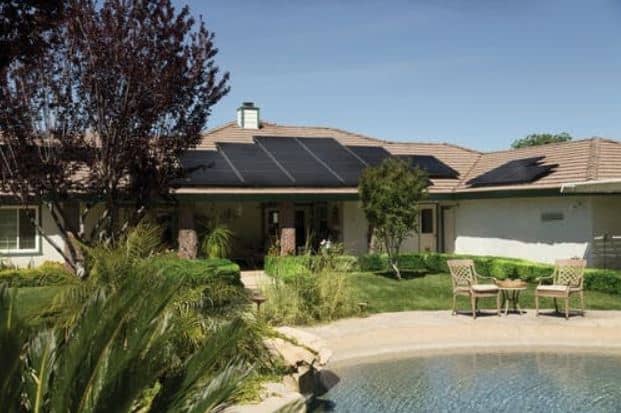 How many solar panels are needed to power a water heater?